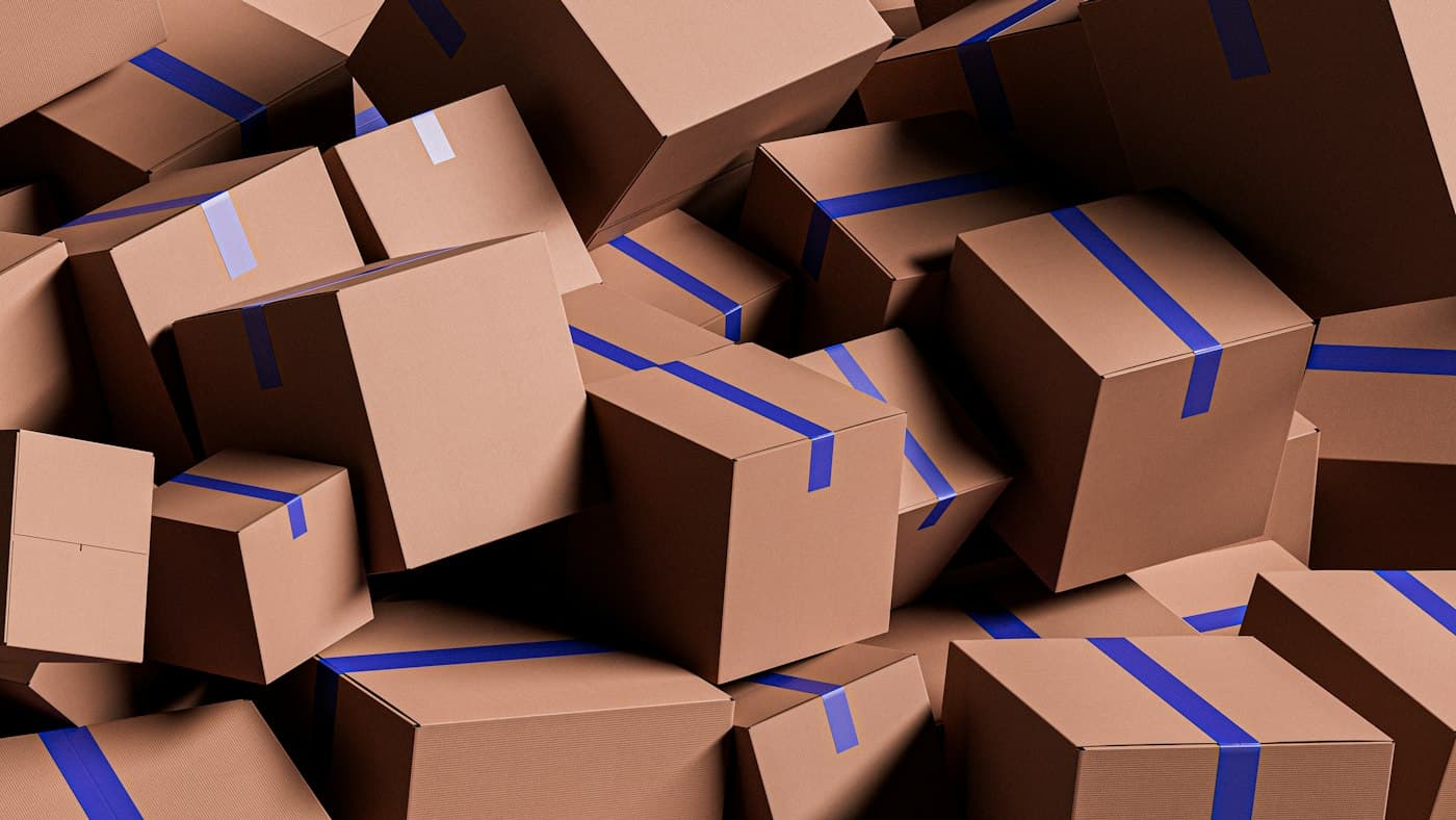 A pile of sealed cardboard boxes ready for delivery